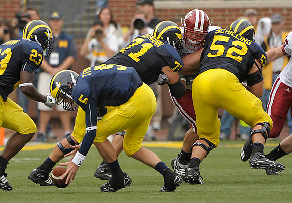 Carlos Brown (23), Tate Forcier (5), Mark Ortmann (71), and Stephen Schilling (52)