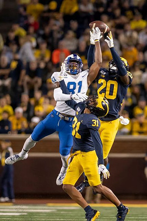 Brad Hawkins (20) and Vincent Gray (31)