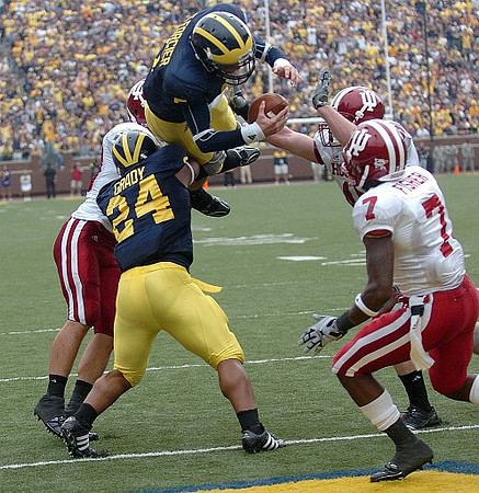 Kevin Grady (24) and Tate Forcier (5)