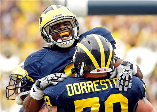 Perry Dorrestein (79) and Martavious Odoms (9)