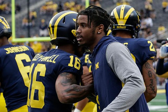 Cornelius Johnson (6), Jaylen Kelly-Powell (16), and Donovan Peoples-Jones (9)