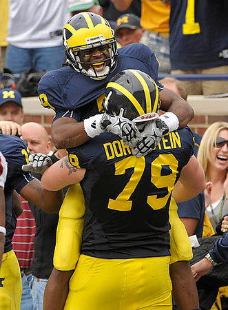 Martavious Odoms (9) and Perry Dorrestein (79)