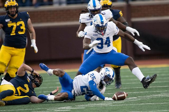 Jalen Mayfield (73), Shea Patterson (2), and Cesar Ruiz (51)