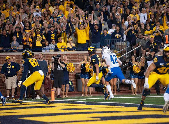 Nick Eubanks (82), Dylan McCaffrey (10), and Ben VanSumeren (40)