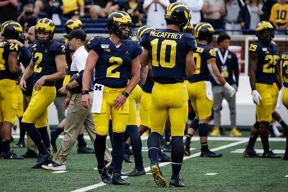 Shea Patterson (2) and Dylan McCaffrey (10)