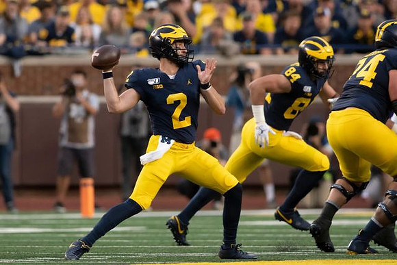 Shea Patterson (2), Sean McKeon (84), and Ben Bredeson (74)