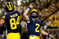 Sean McKeon (84) and Shea Patterson (2)