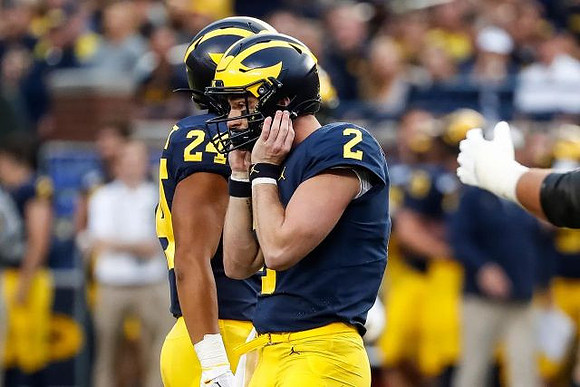 Zach Charbonnet (24) and Shea Patterson (2)