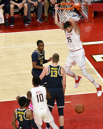 Zavier Simpson (3), Muhammad-Ali Abdur-Rahkman (12), and Moritz Wagner (13)