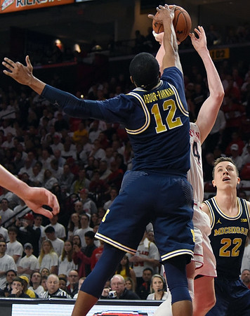 Muhammad-Ali Abdur-Rahkman (12) and Duncan Robinson (22)