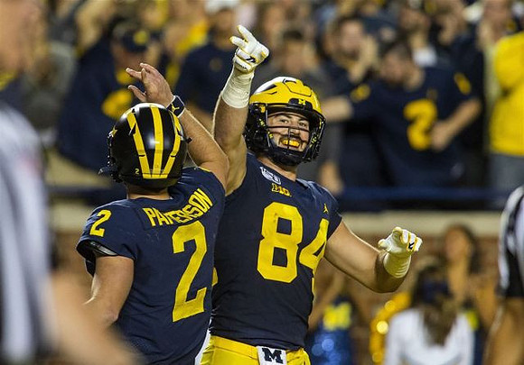 Shea Patterson (2) and Sean McKeon (84)