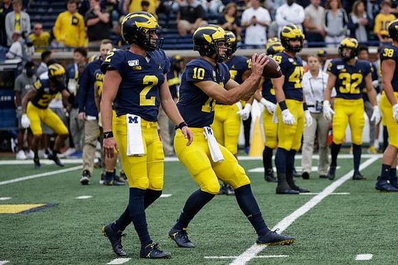 Shea Patterson (2) and Dylan McCaffrey (10)