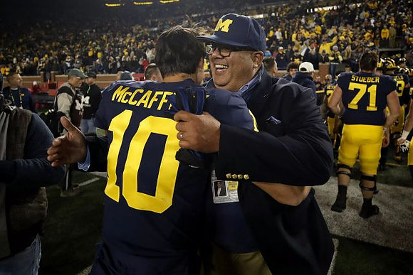 Dylan McCaffrey (10), Warde Manuel, and Andrew Stueber (71)