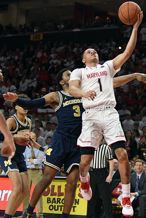 Zavier Simpson (3) and Jordan Poole (2)