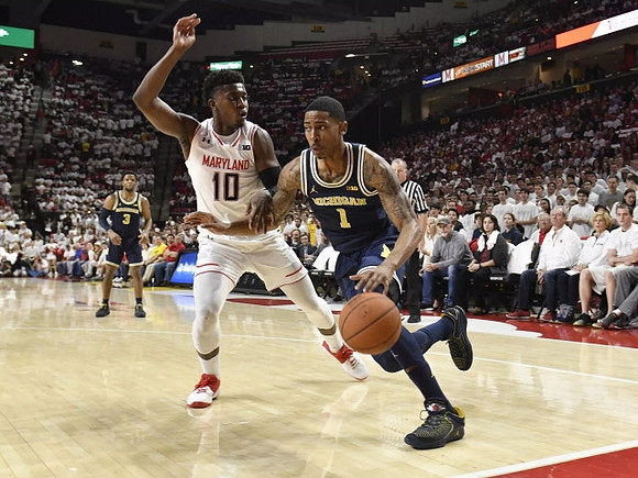 Charles Matthews (1) and Zavier Simpson (3)