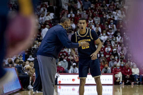 Juwan Howard and Caleb Houstan (22)