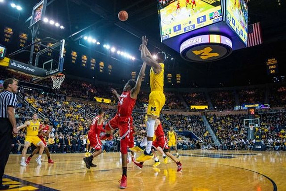 Charles Matthews (1), Ignas Brazdeikis (13), and Zavier Simpson (3)