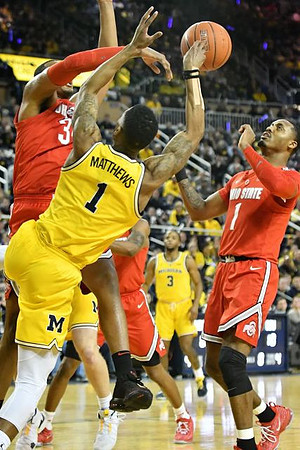 Charles Matthews (1) and Zavier Simpson (3)