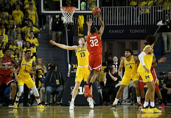Charles Matthews (1), Ignas Brazdeikis (13), Isaiah Livers (4), and Jordan Poole (2)