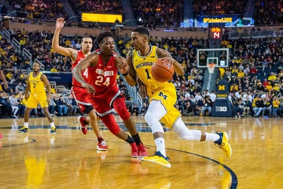 Charles Matthews (1) and Zavier Simpson (3)