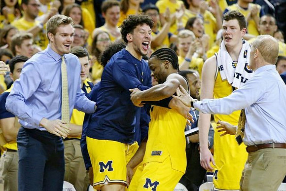 Zavier Simpson (3), John Beilein, and Michigan Team