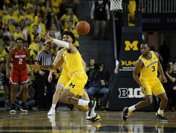 Isaiah Livers (4) and Zavier Simpson (3)