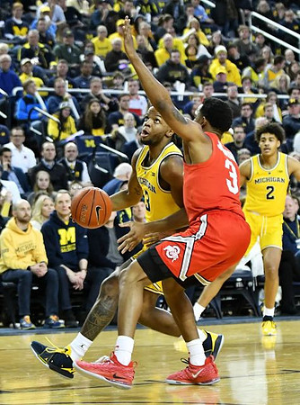 Zavier Simpson (3) and Jordan Poole (2)