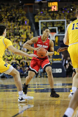 Brandon Johns Jr. (23) and Ignas Brazdeikis (13)