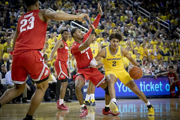 Jordan Poole (2) and Isaiah Livers (4)