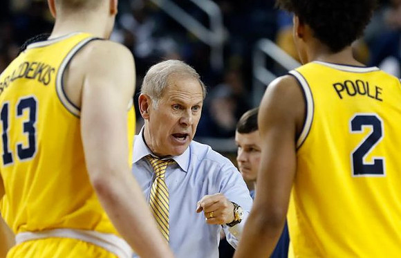 Ignas Brazdeikis (13), John Beilein, and Jordan Poole (2)