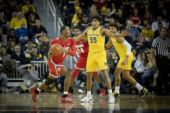 Eli Brooks (55) and Isaiah Livers (4)