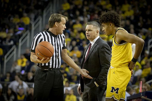 Ohio State Head Coach Chris Holtmann and Jordan Poole (2)