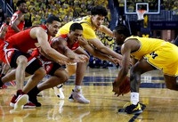 Brandon Johns Jr. (23) and Zavier Simpson (3)