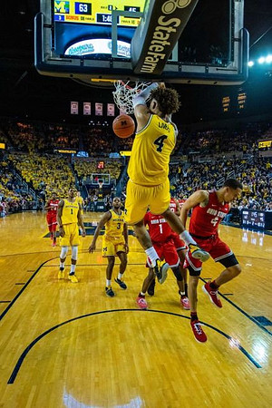 Isaiah Livers (4), Charles Matthews (1), and Zavier Simpson (3)