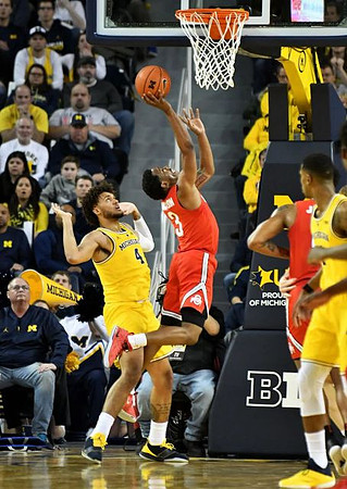 Isaiah Livers (4) and Charles Matthews (1)