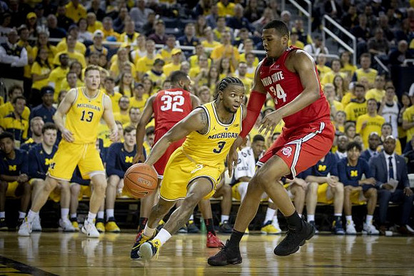 Zavier Simpson (3) and Ignas Brazdeikis (13)