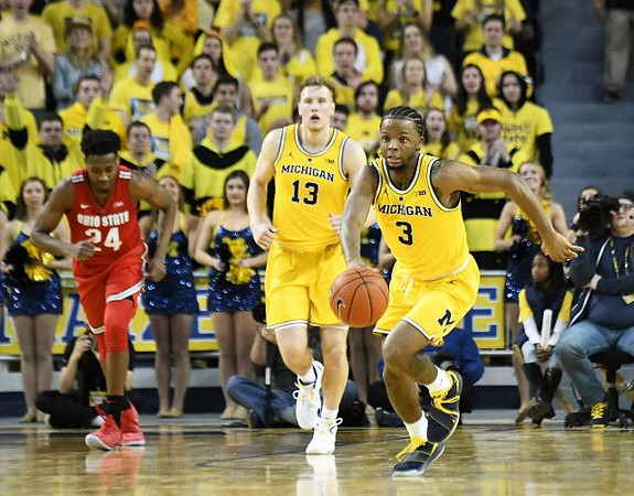 Ignas Brazdeikis (13) and Zavier Simpson (3)