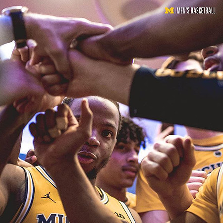 Zavier Simpson (3) and Eli Brooks (55)