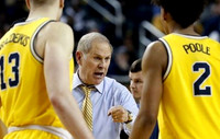 Ignas Brazdeikis (13), John Beilein, and Jordan Poole (2)