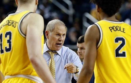 Ignas Brazdeikis (13), John Beilein, and Jordan Poole (2)