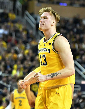 Ignas Brazdeikis (13) and Jordan Poole (2)