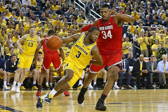 Zavier Simpson (3) and Ignas Brazdeikis (13)
