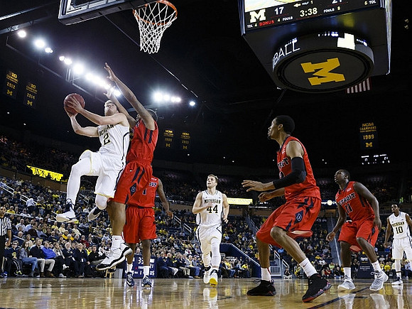 Spike Albrecht (2), Max Bielfeldt (44), and Derrick Walton Jr. (10)