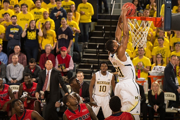 Derrick Walton Jr. (10) and Zak Irvin (21)
