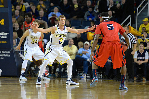 Mark Donnal (34) and Spike Albrecht (2)