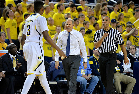 Bacari Alexander, Kameron Chatman (3), and John Beilein