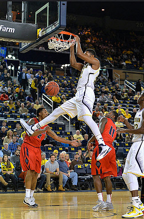 Zak Irvin (21) and Caris LeVert (23)