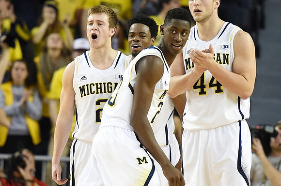 Spike Albrecht (2), Derrick Walton Jr. (10), Caris LeVert (23), and Max Bielfeldt (44)