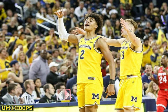Jordan Poole (2) and Ignas Brazdeikis (13)