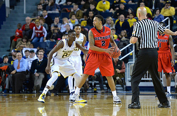 Caris LeVert (23) and Zak Irvin (21)